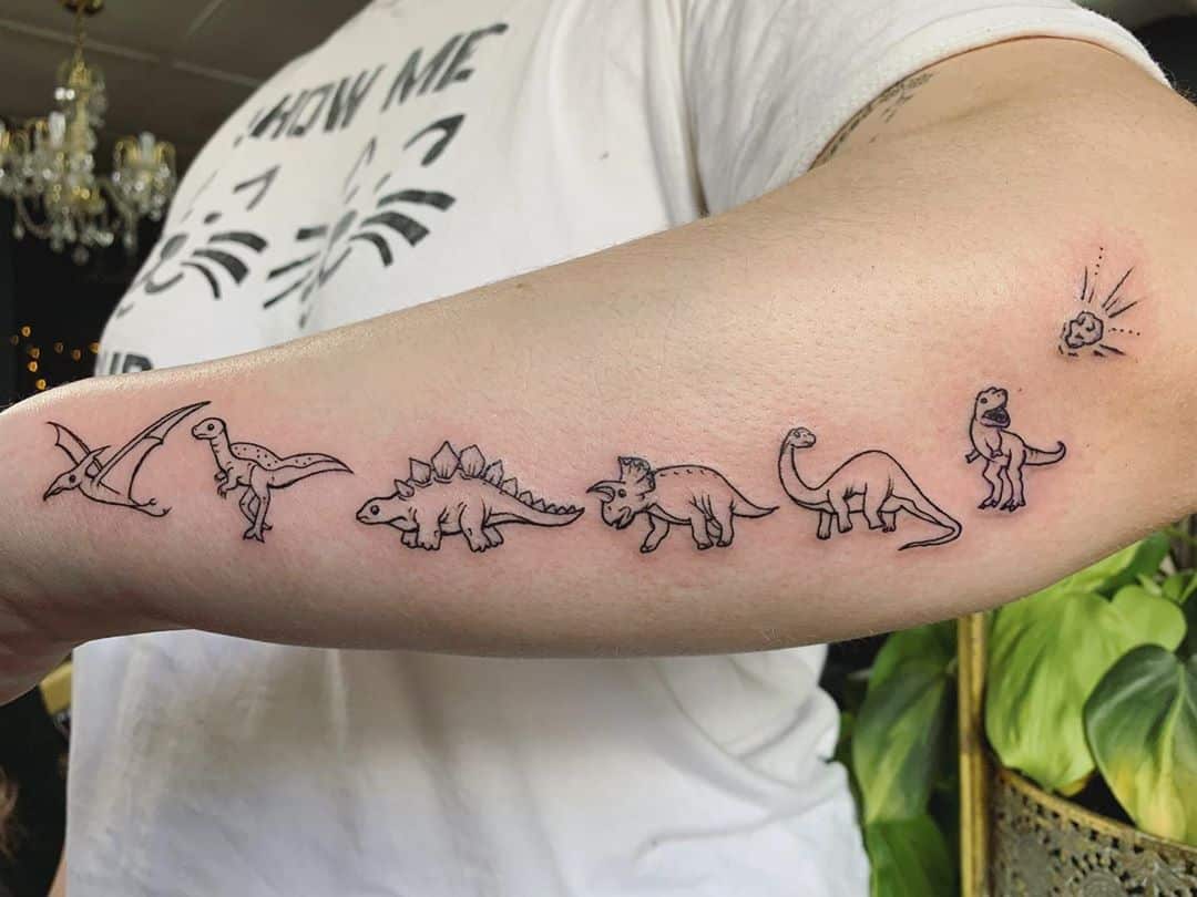 1. Matching Couple Dinosaur Tattoos - wide 4