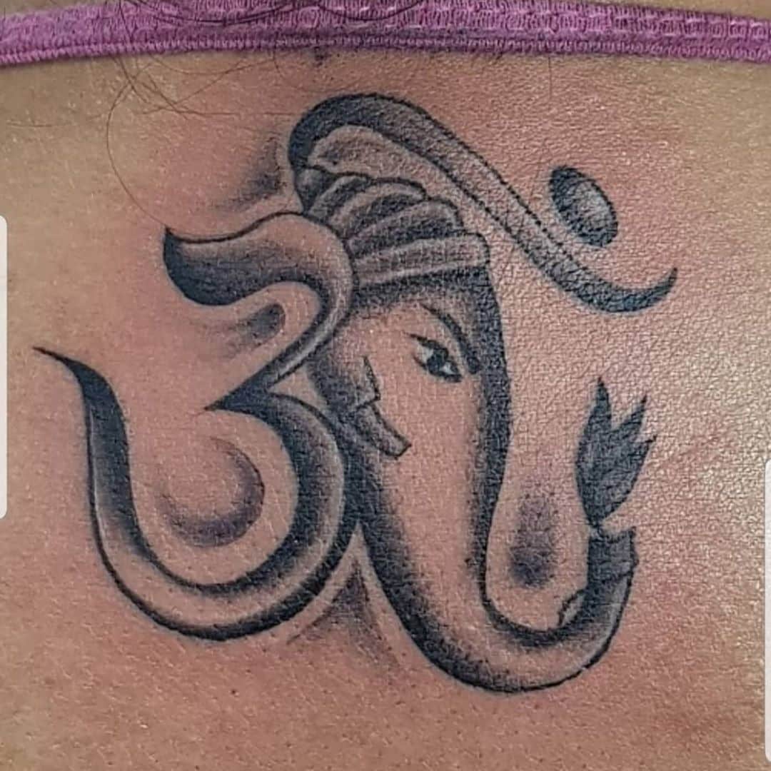 Angel Tattoo Design Studio - Ganesha Tattoo with om. Made this tattoo  yesterday. Client was looking for a simple design of Ganesha, meanwhile was  wanting small om with it. Client was very