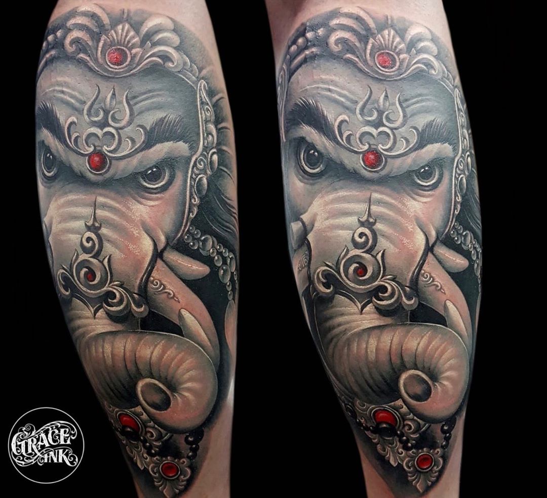 ganesh tattoo forearm