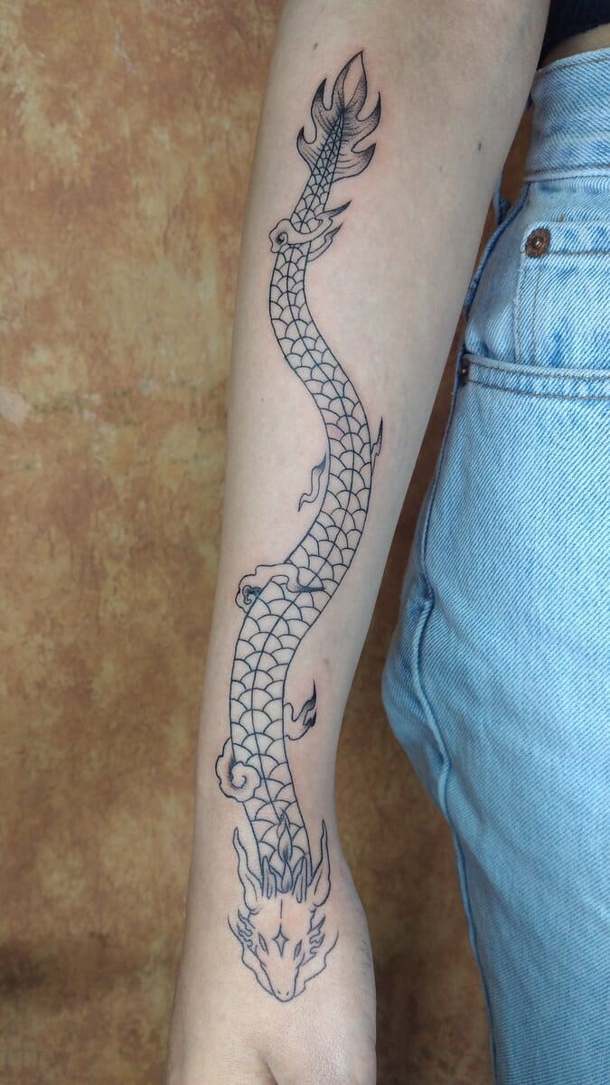 paulette-darko-tattoo-artist-dragon-arm