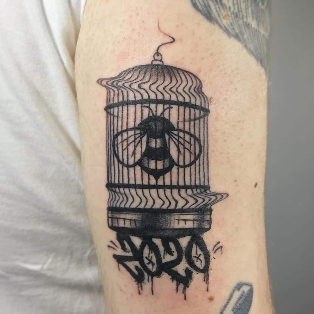 bee-in-a-cage-tattoo-covid