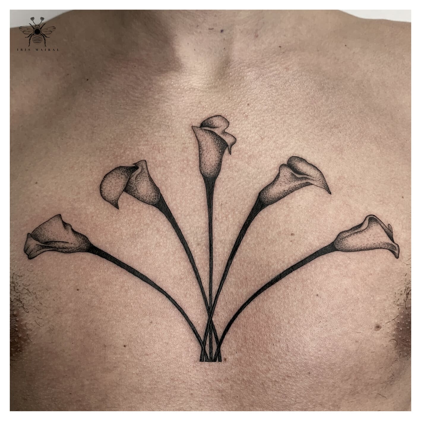 iris-mairal-tattoo-artist-flowers-chest-blackwork