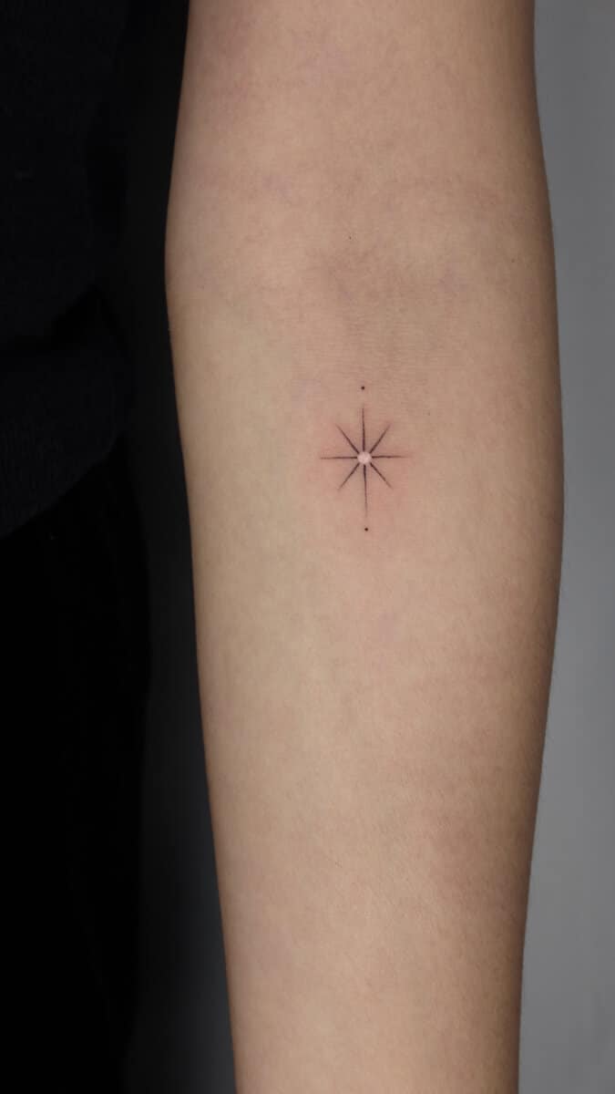 jo-ink-tattoo-artist-star-arm