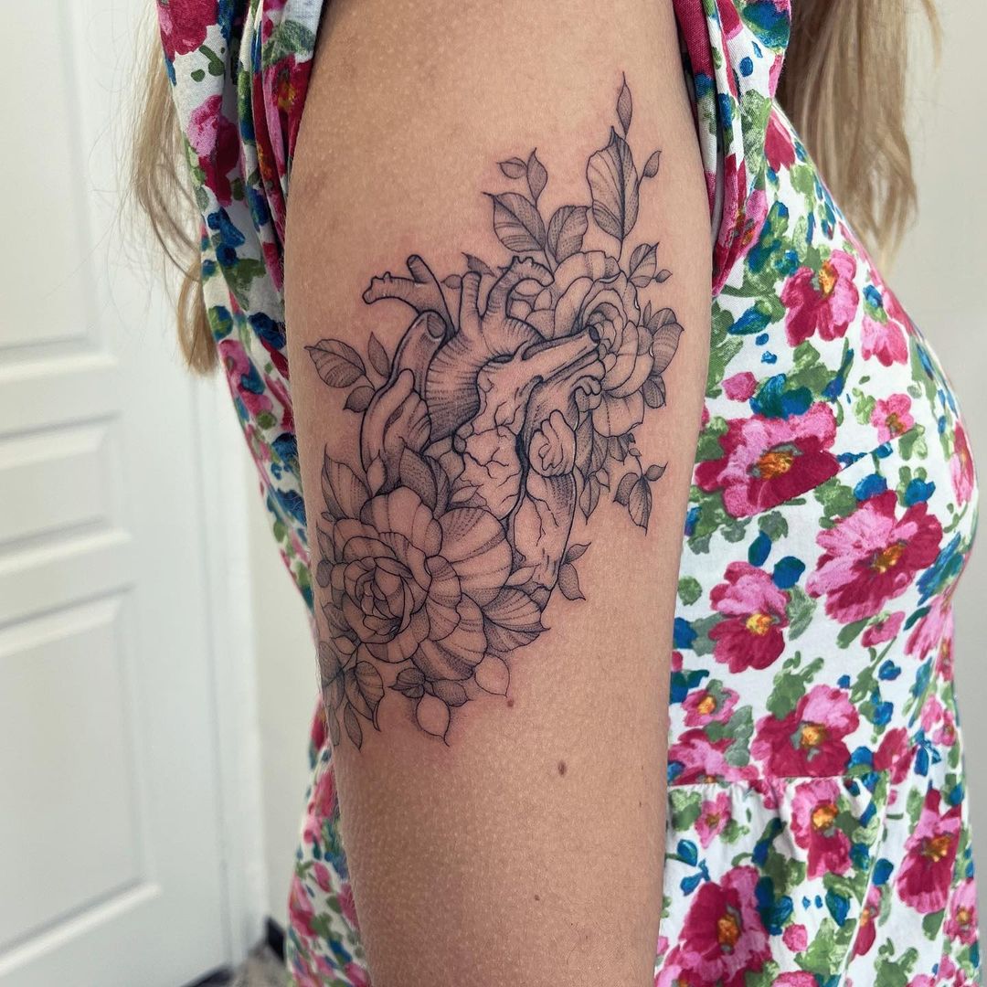 roses-and-heart-woman-tattoo-ideas-julien