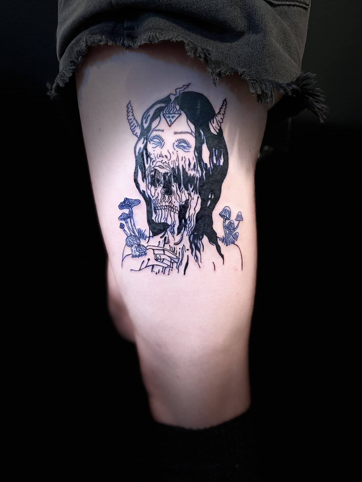 kristal haze tattoo artist woman demon leg
