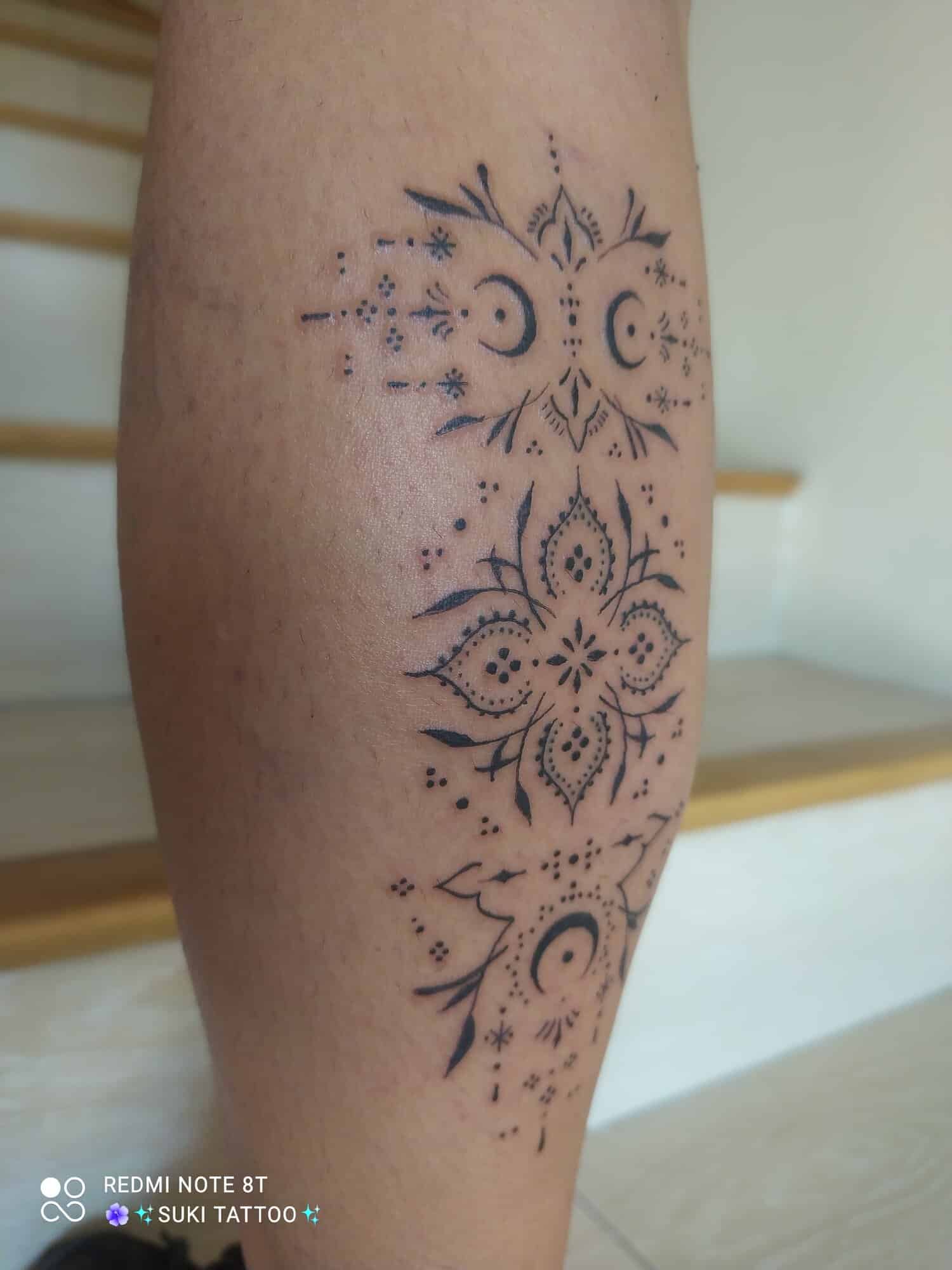 laura suarez tattoo artist ornamental arm