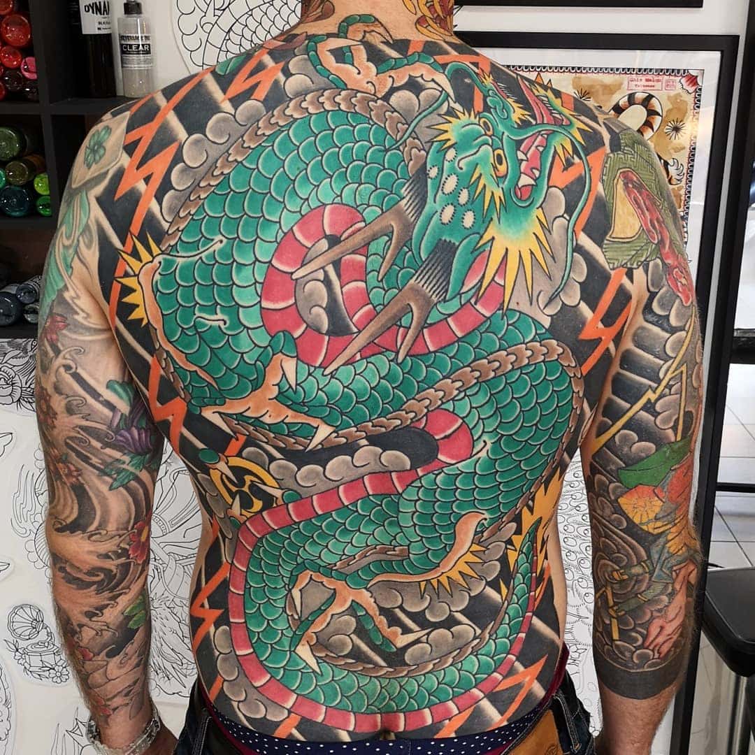 japenese green dragon tattoo ghis melou