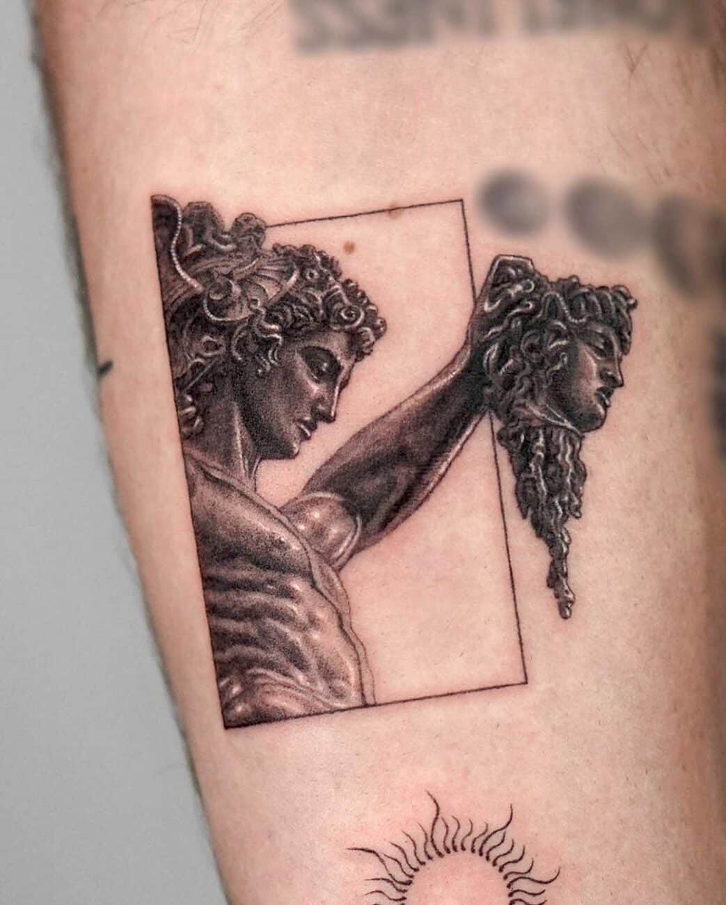 Perseus holding Medusas head Tattoo made by Michael Stade  mikestatuering on Instagram Perseus healed Medusa fresh  rtattoo