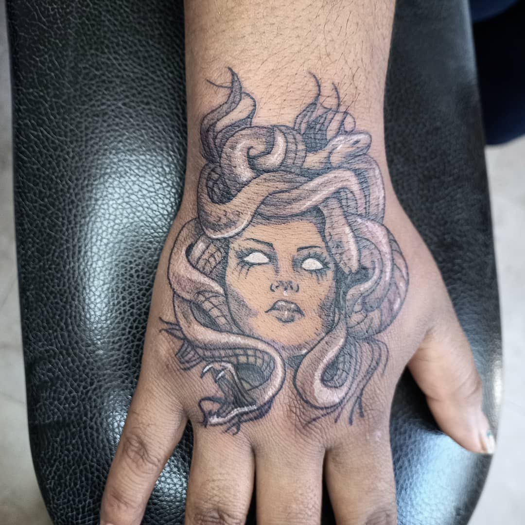medusa-hand-tattoo-white-ink