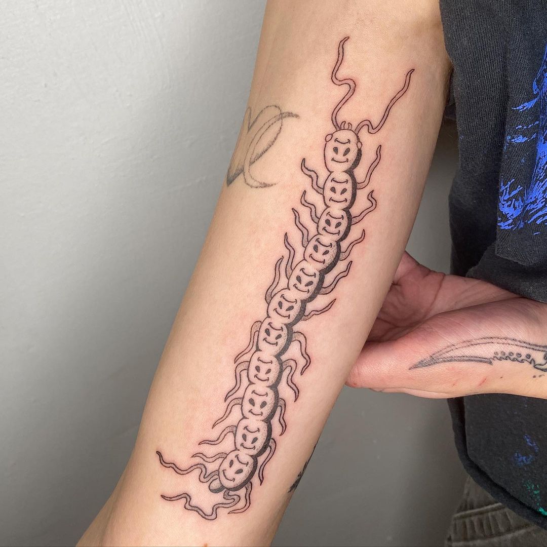 Premium Vector  Centipede heads with skulls traditional tattoo