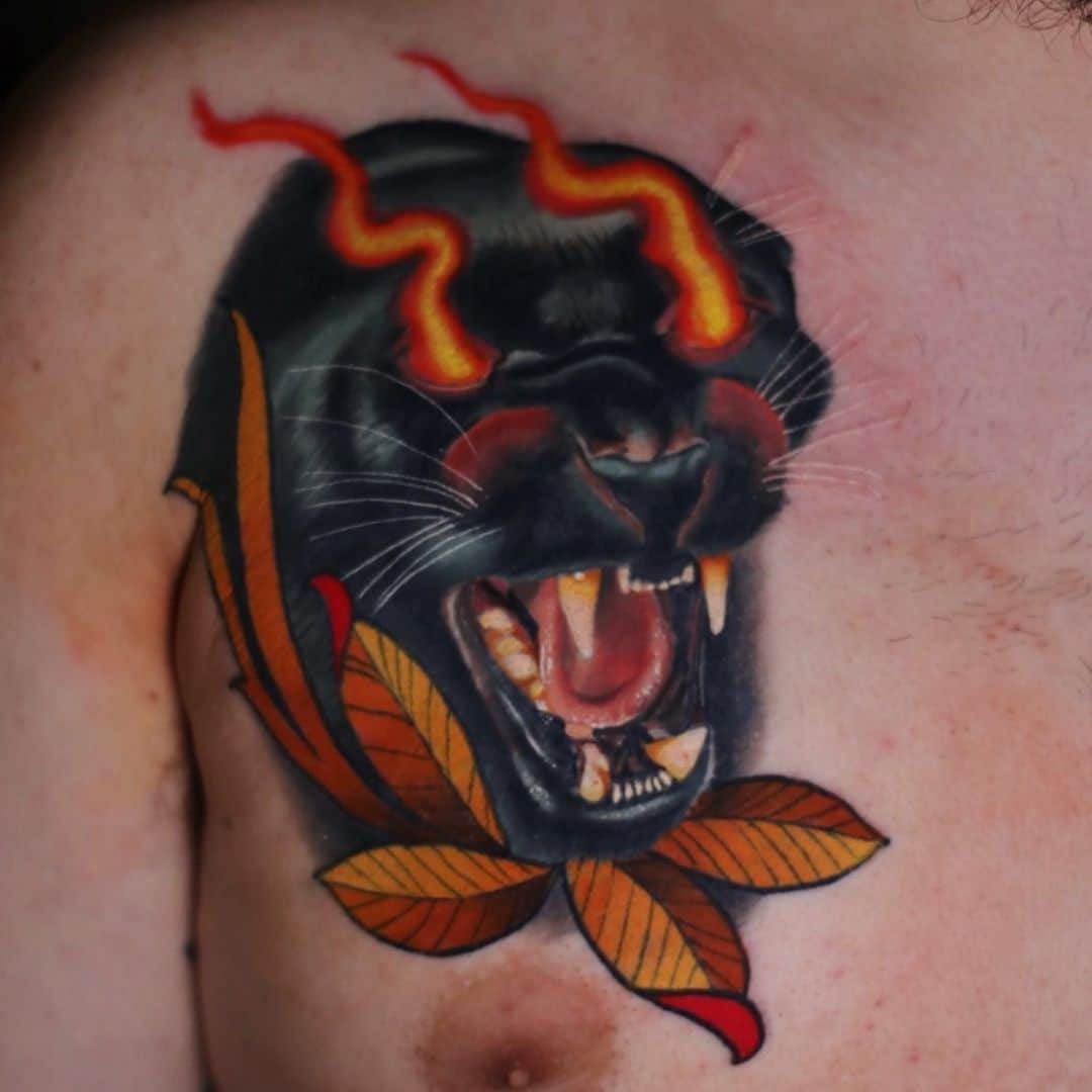 jaguar head red eyes jose guevara tattoo