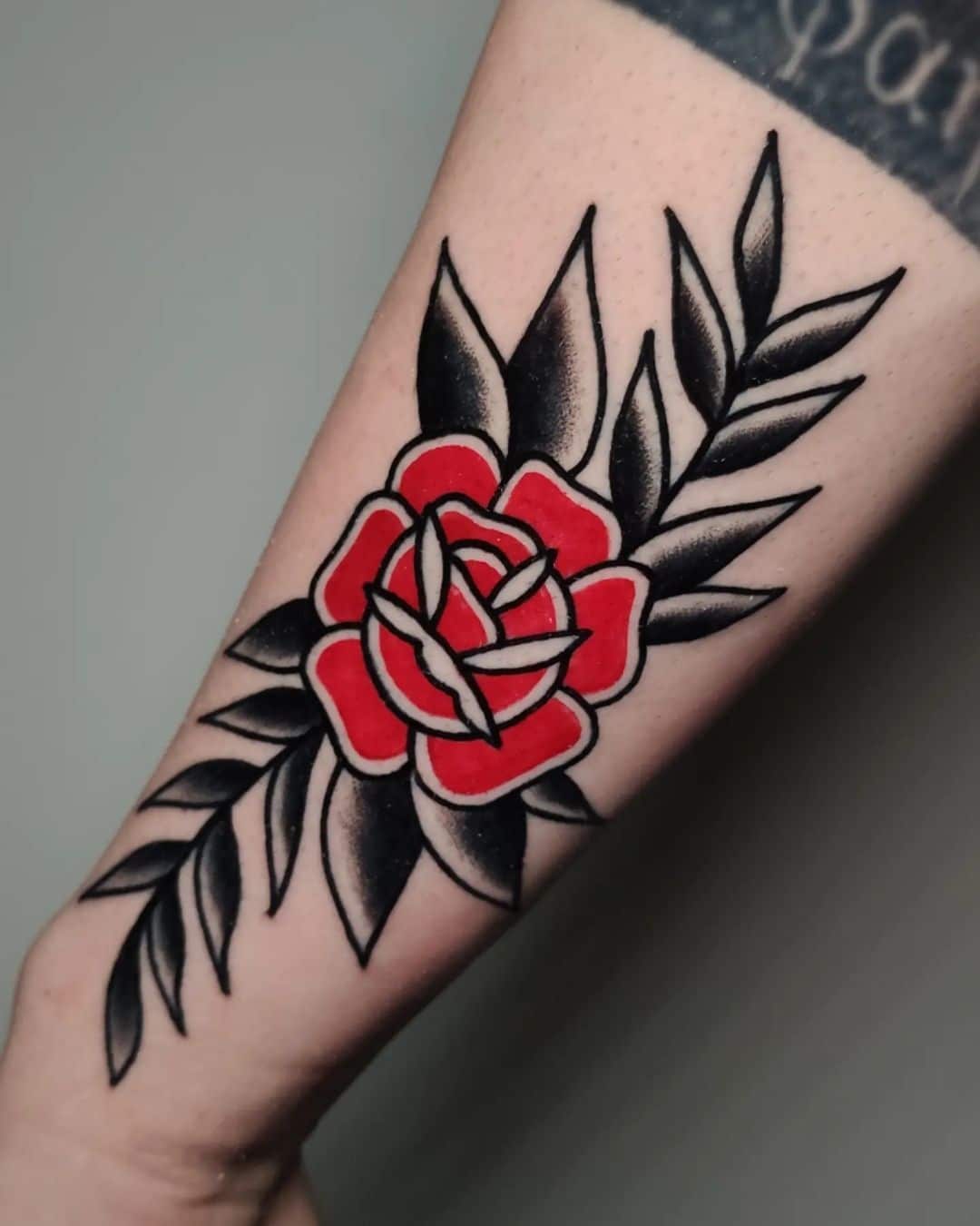 traditional-simple-rose-tattoo-carlos