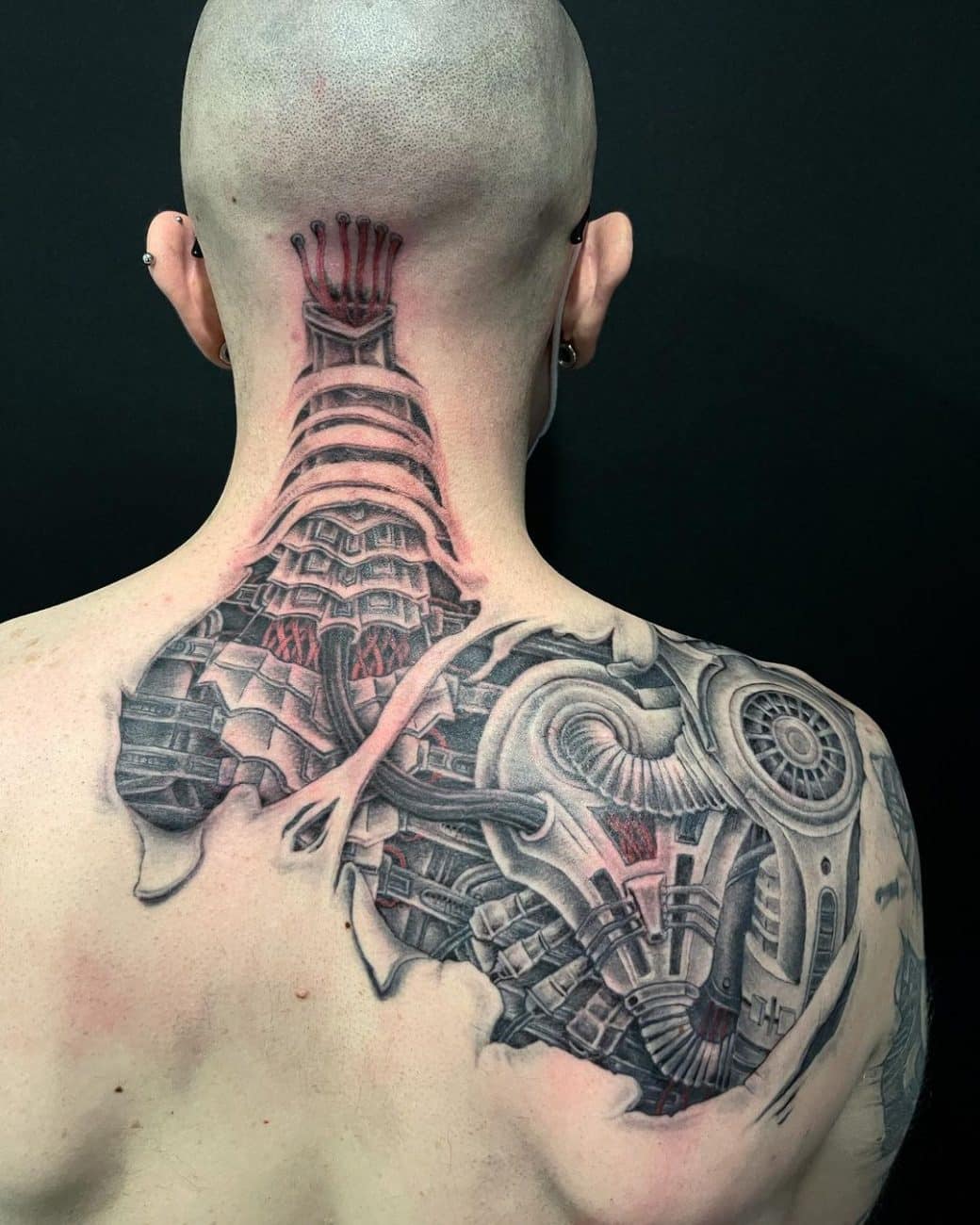 Biomechanical Tattoo Guide with tons of examples