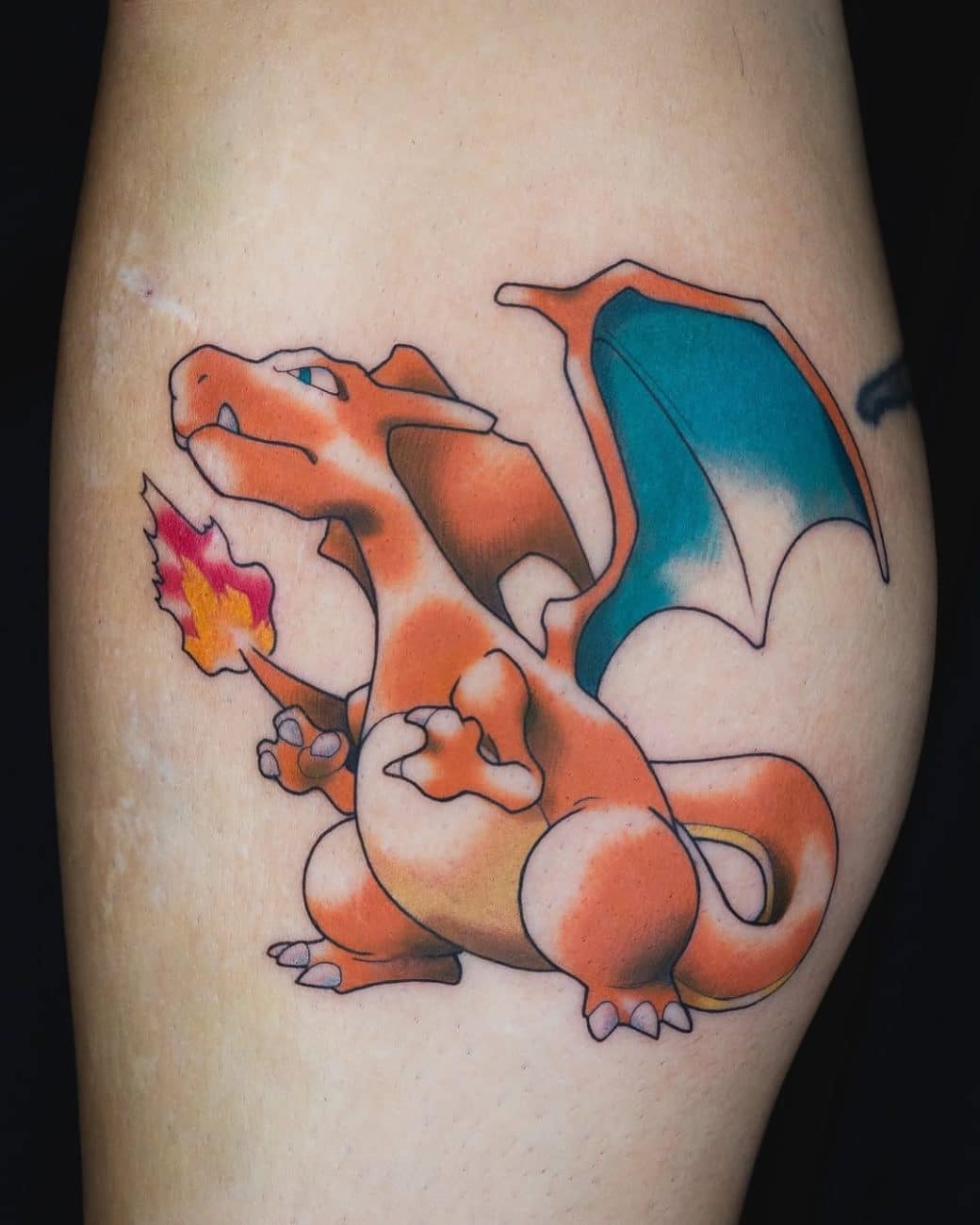 charizard-pokemon-tattoo-anime-style-zinke
