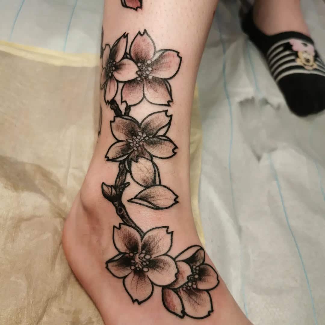 cherry-blossom-tattoo-ankle-thomas-krug-germany