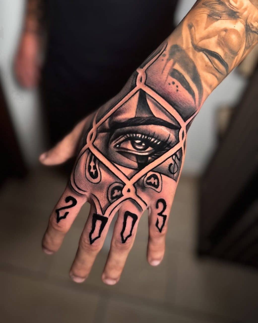chicano hand tattoo eye robo
