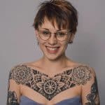 dotwork geometric chest tattoo krzysztof krajewski