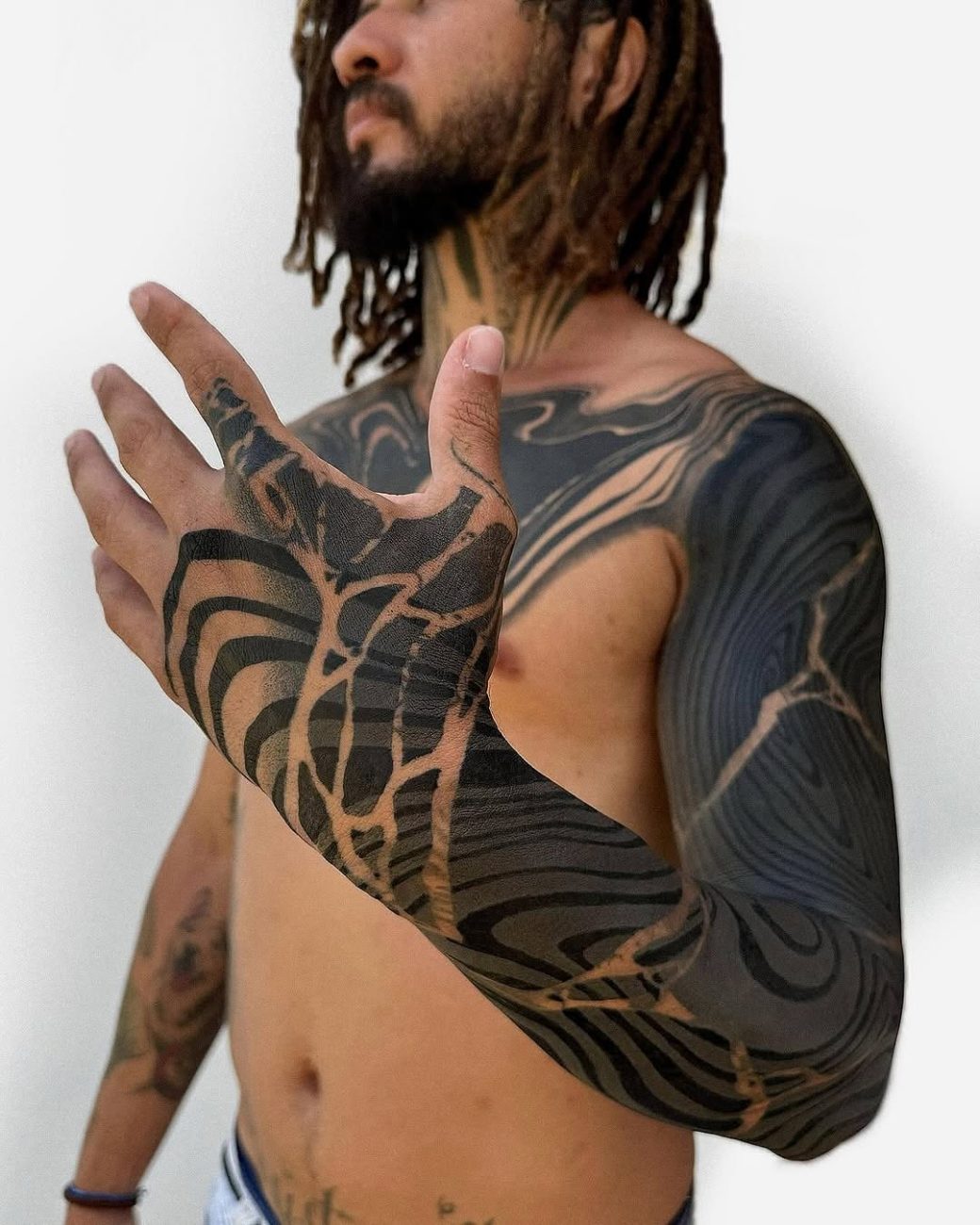 geometric cover up tattoo bodgan italy