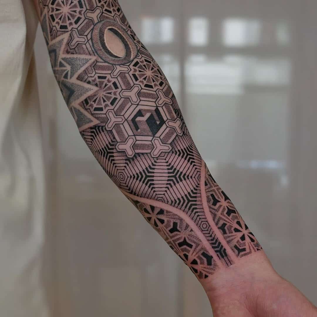 geometric dotwork tattoo cadi