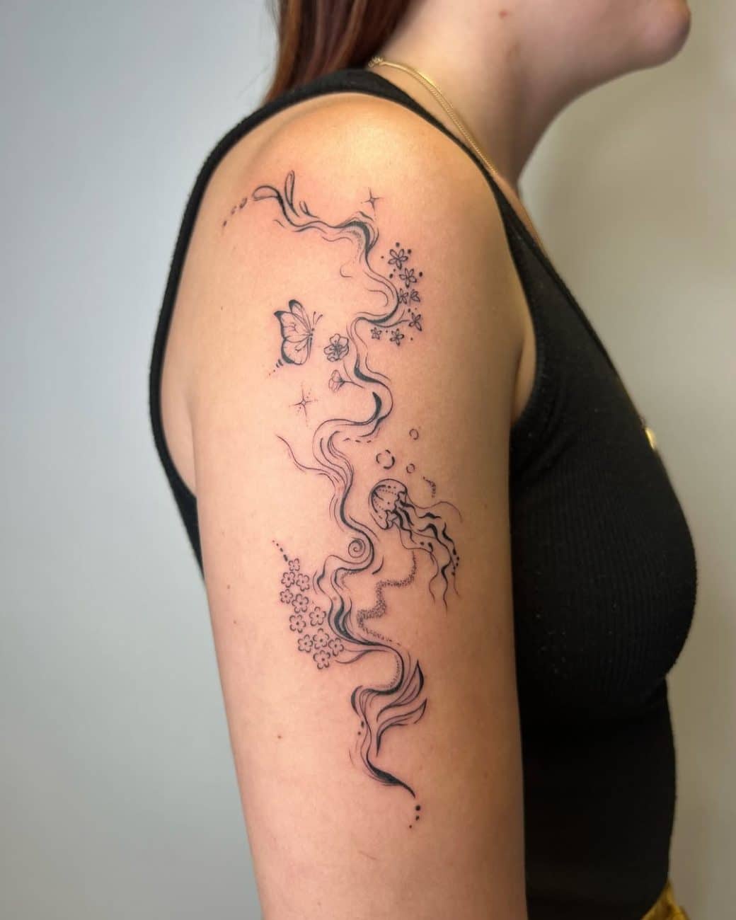 jellyfish tattoo with butterfly enii 1