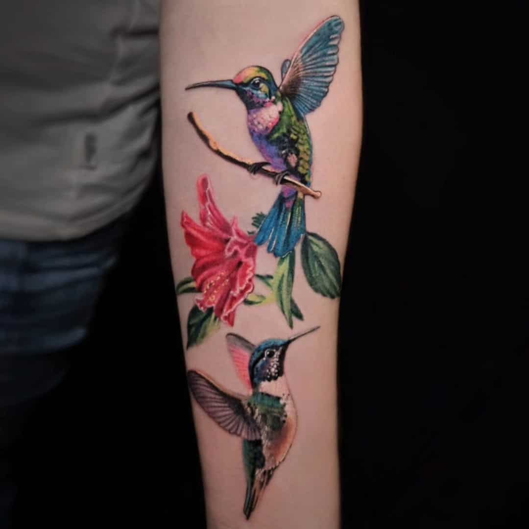 two hummingbirds tattoo realistic style kassel