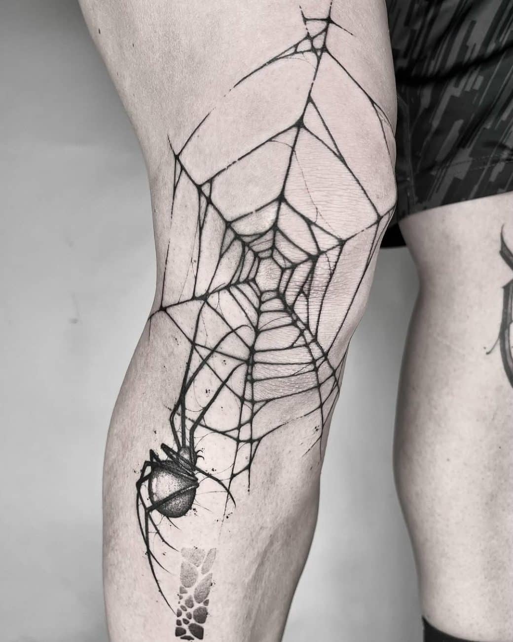 spider-tattoo-with-web-maksym-kuznetsov-black-ink